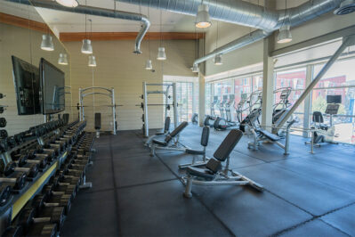 Fitness center with cardio equipment and weighs