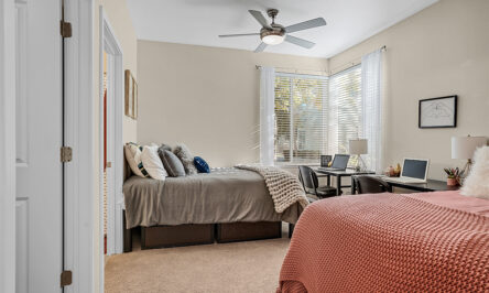 Apartment bedroom furnished with 2 beds