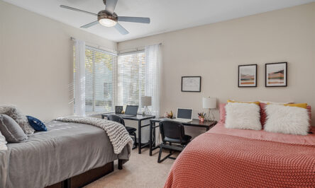 Apartment bedroom furnished with 2 beds